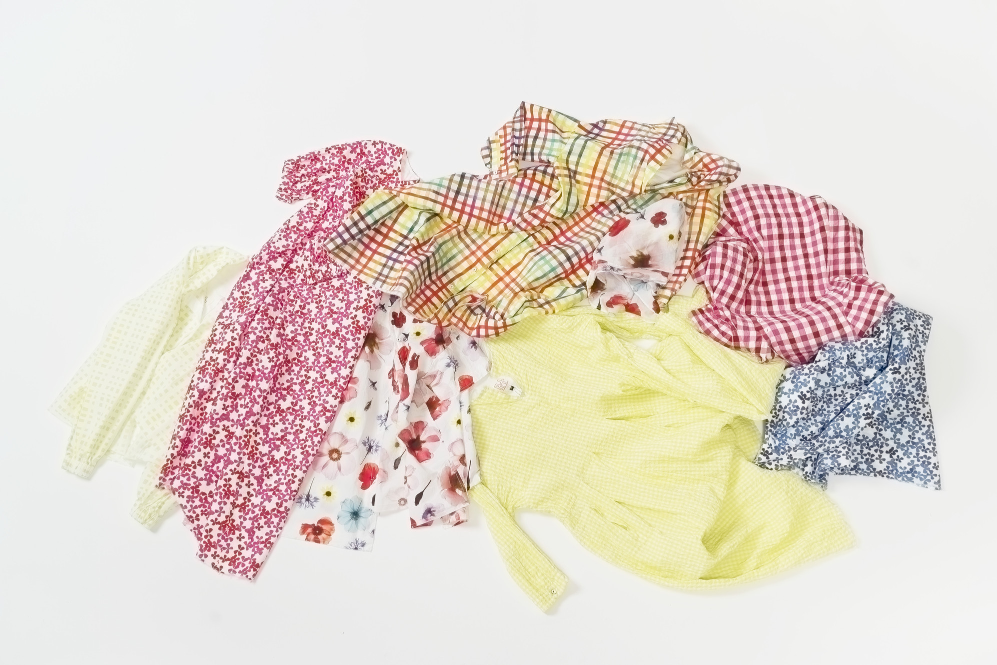 H+ Hannoh Wessel lookbook flat lay with colorful pieces