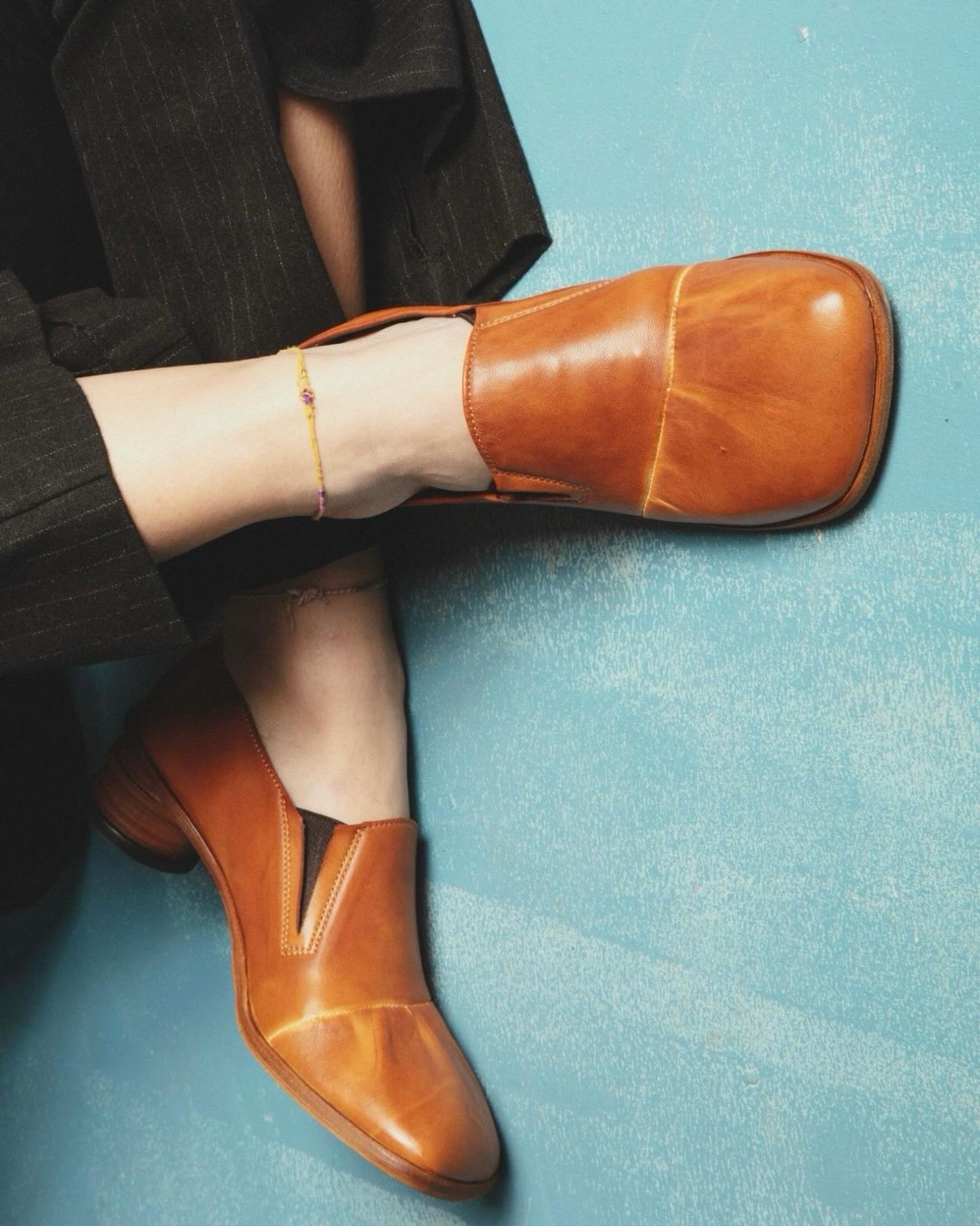 Shoto tan square-toe shoe worn in a styling shot