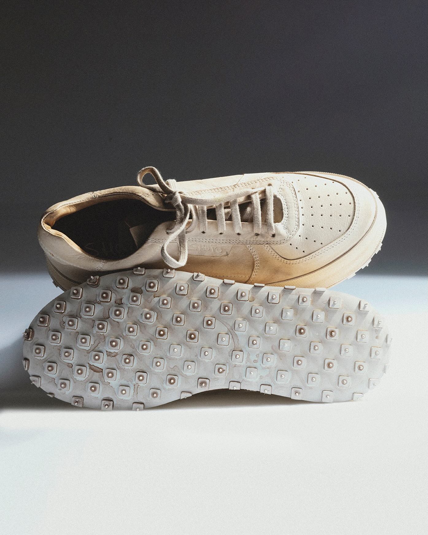 Shoto cream sneaker with studded outsole detail