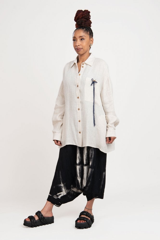 SOH white shirt with black draped trousers